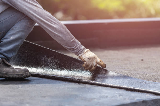 Professional Exterior Waterproofing technician working in Alexander City, AL